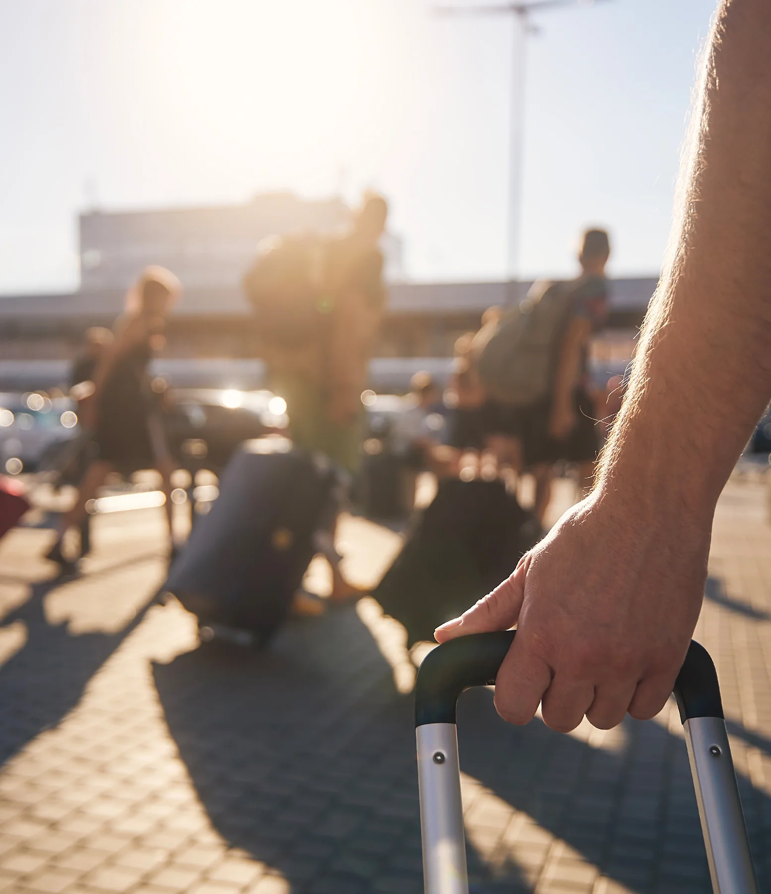 hoilday goers pulling their suitcases